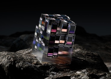 a cube shaped building on a rock