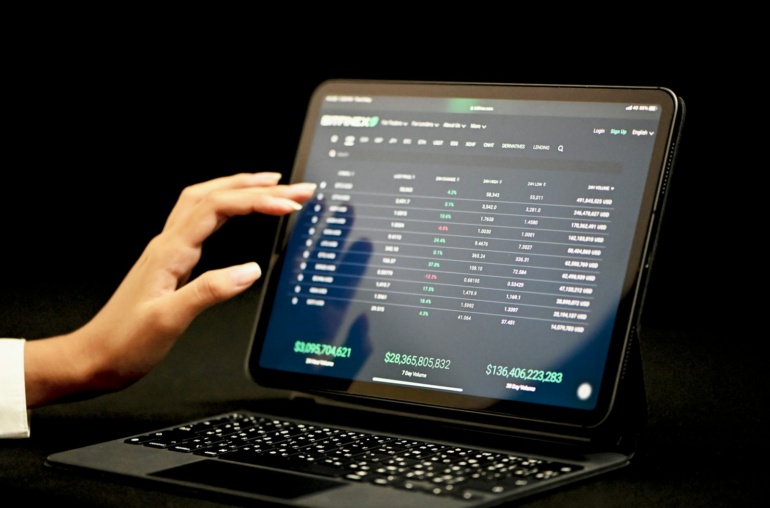 black laptop computer turned on displaying blue screen