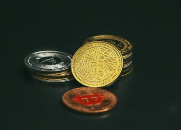 a pile of coins sitting on top of a table