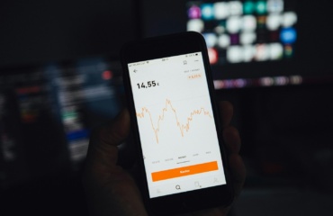 black android smartphone displaying google search