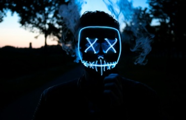 man wearing LED mask