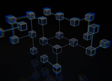 a group of cubes that are on a black surface